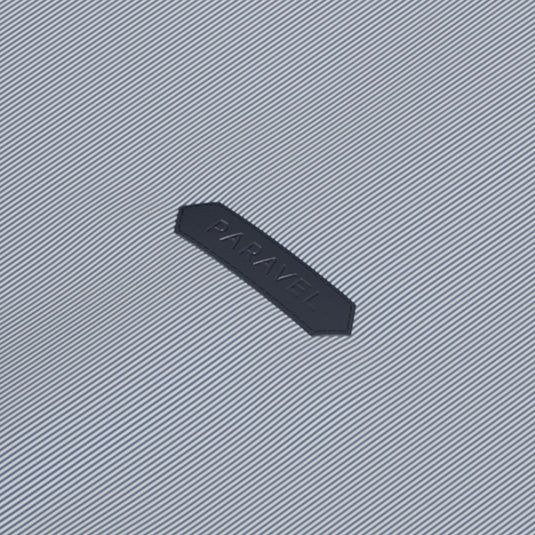 a black label on a striped surface