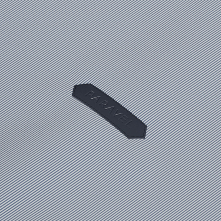 a black label on a striped surface