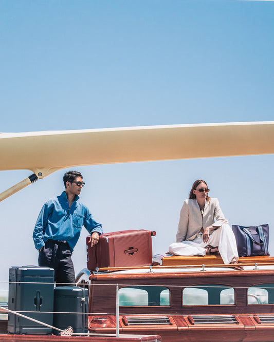 a man and woman on a boat