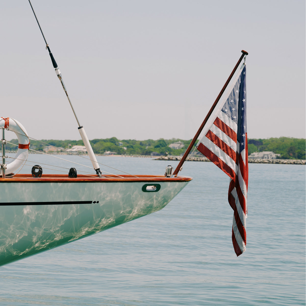 a boat with a flag on the front