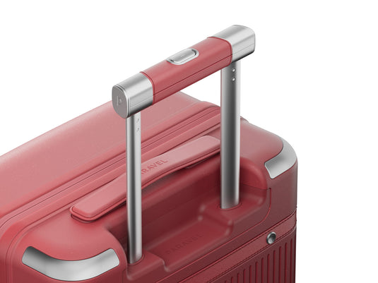 a close up of a red suitcase