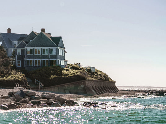 a house on a rocky shore