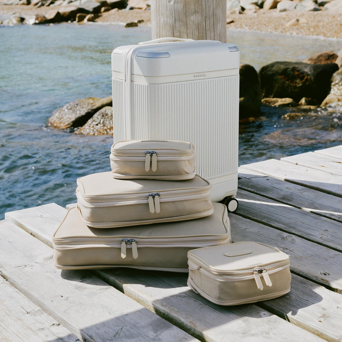 a stack of luggage on a dock