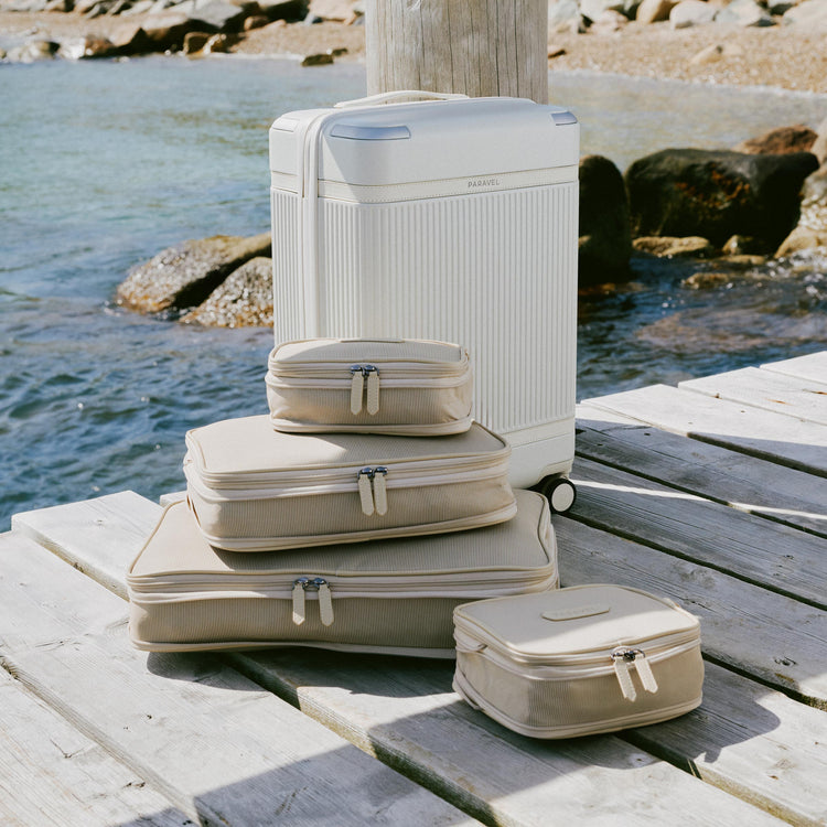 a stack of luggage on a dock