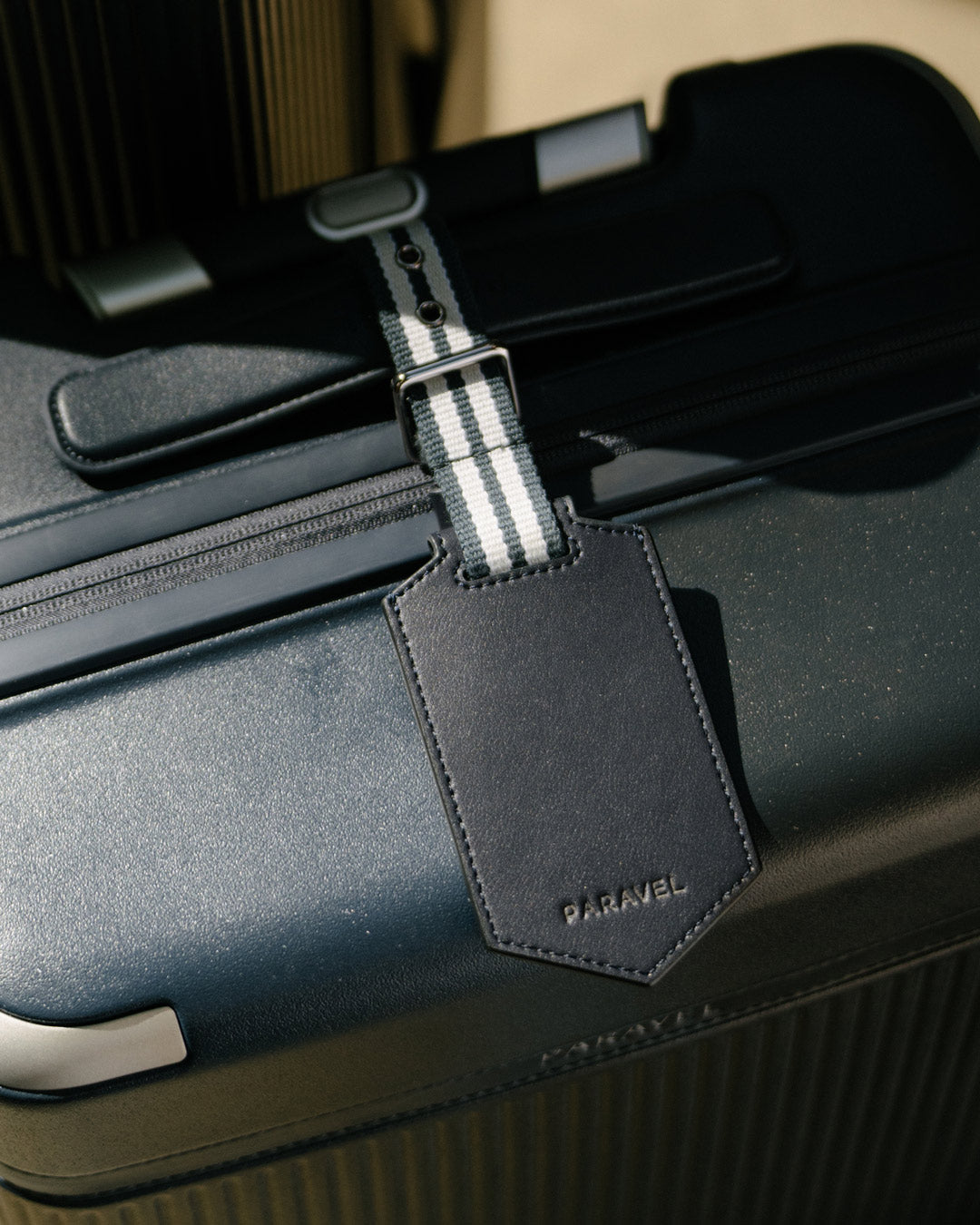 a luggage tag on a suitcase