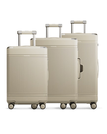 a group of luggage on wheels
