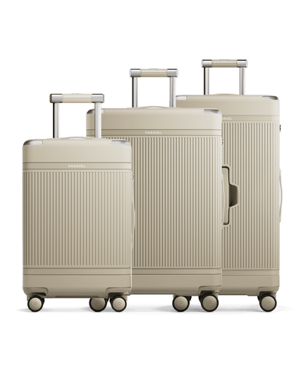 a group of luggage on wheels
